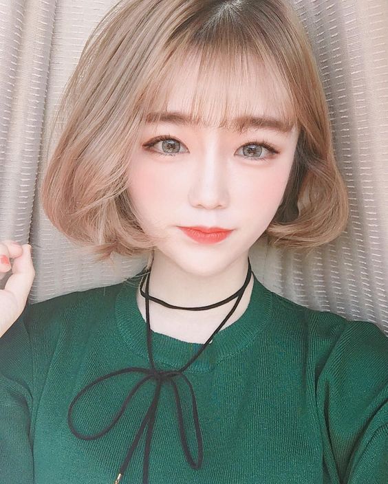 Kiểu tóc ngang vai mái thưa kết hợp cụp đuôi 2